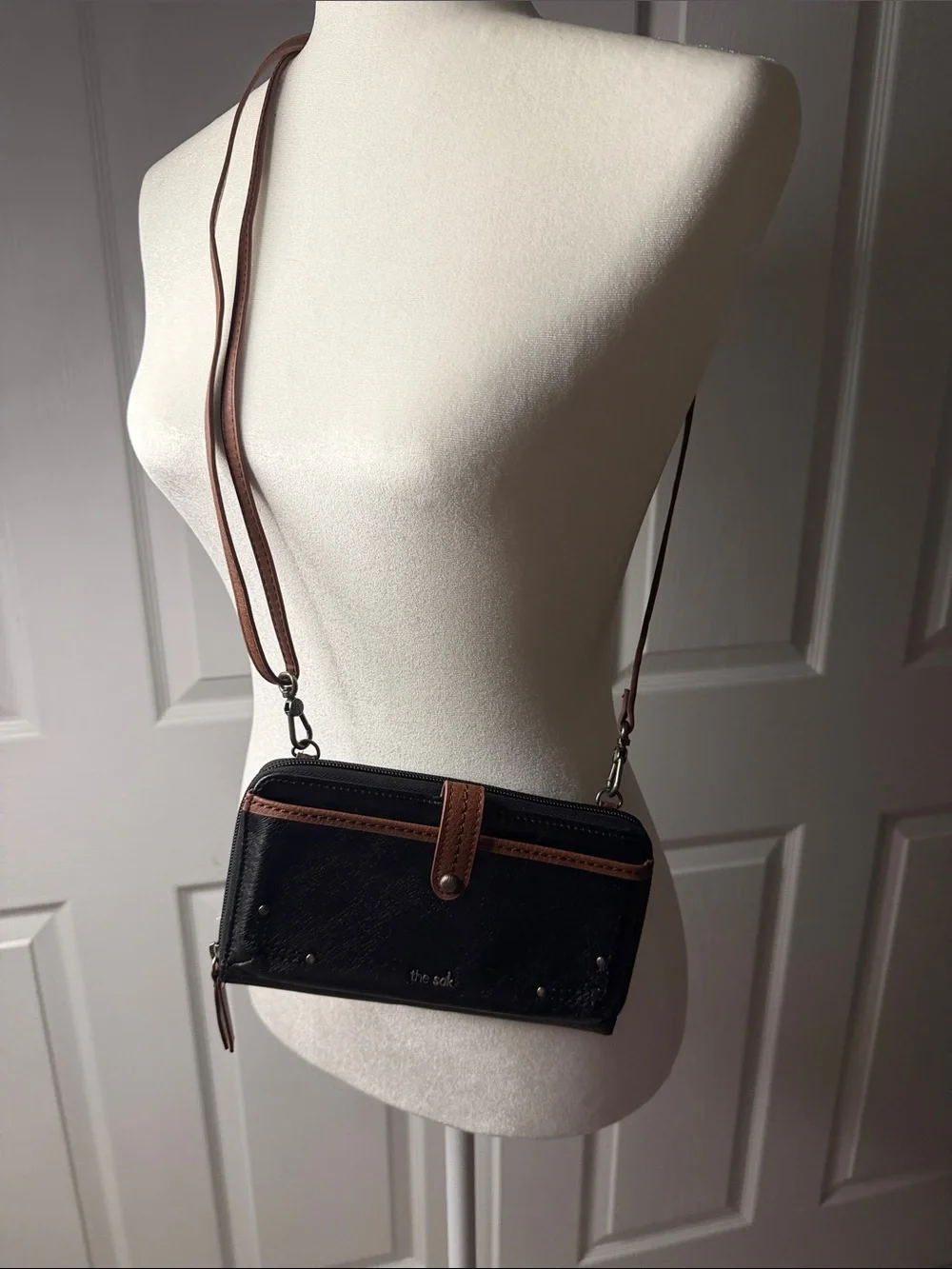 The Sak Black and Brown Leather Wristlet Wallet with Strap